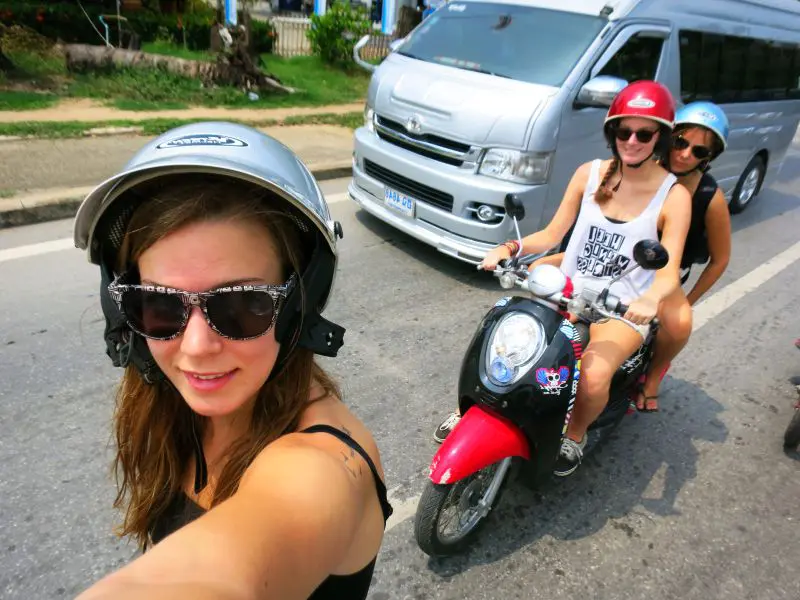 Riders on a scooter